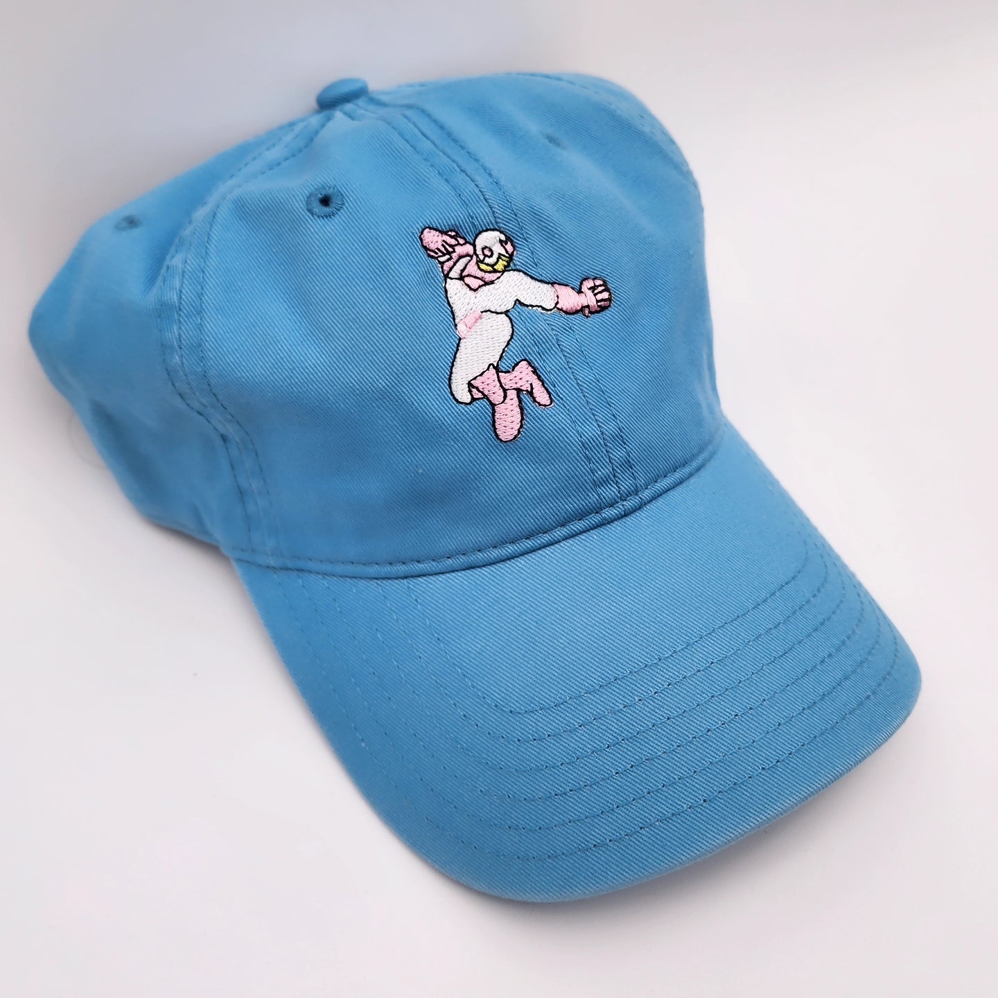 C. FALCON DAD HAT